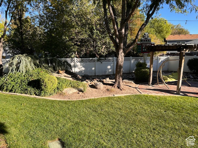 View of yard with fence