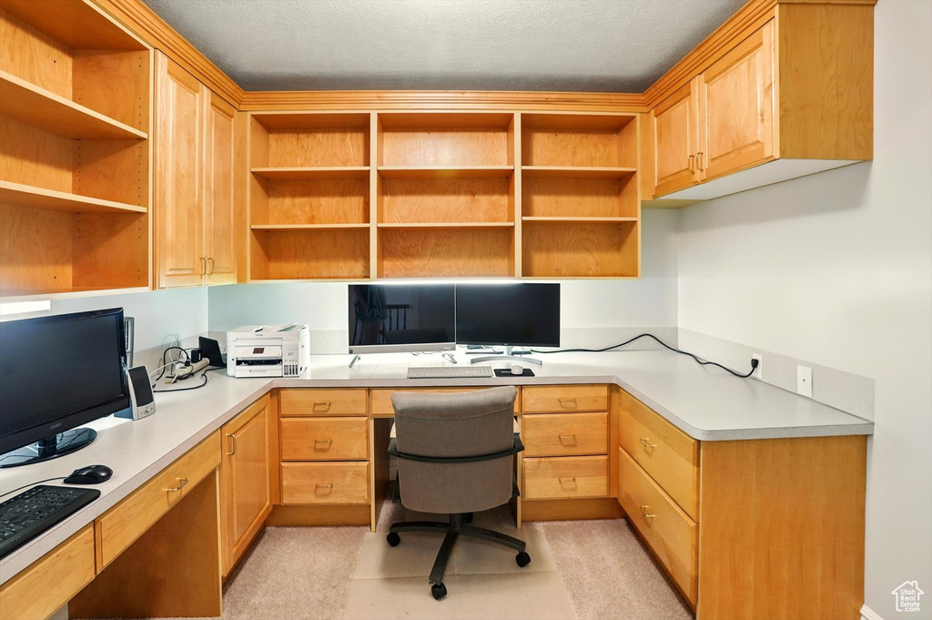 Office featuring built in desk