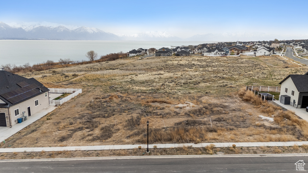 Aerial view of residential area with a water and mountain view