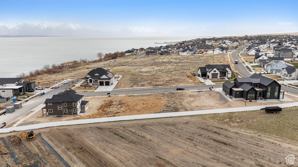 Aerial view of residential area with a nearby body of water