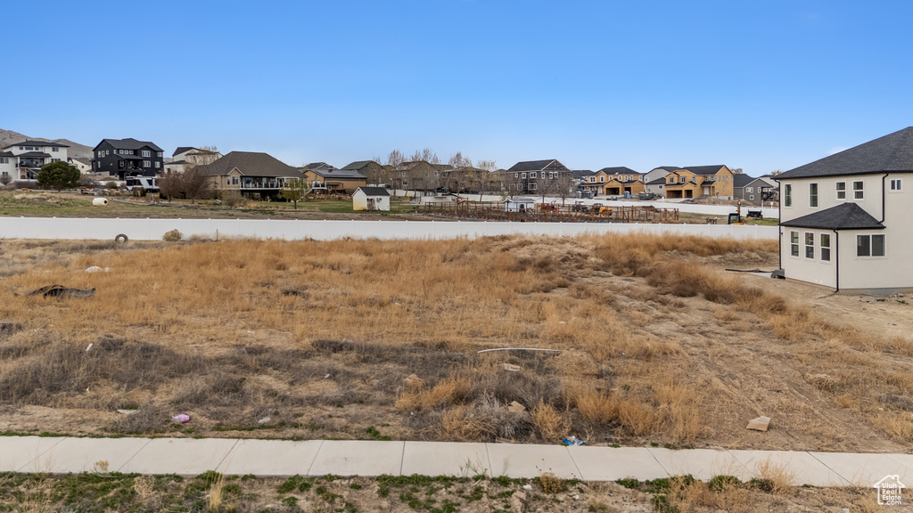 View of yard featuring a residential view