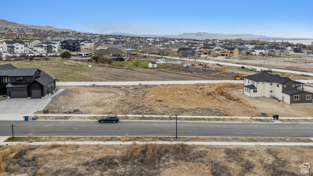 Aerial view of residential area featuring mountains
