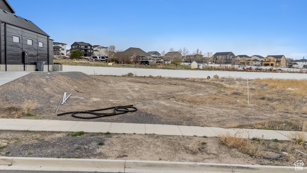 View of yard with a residential view
