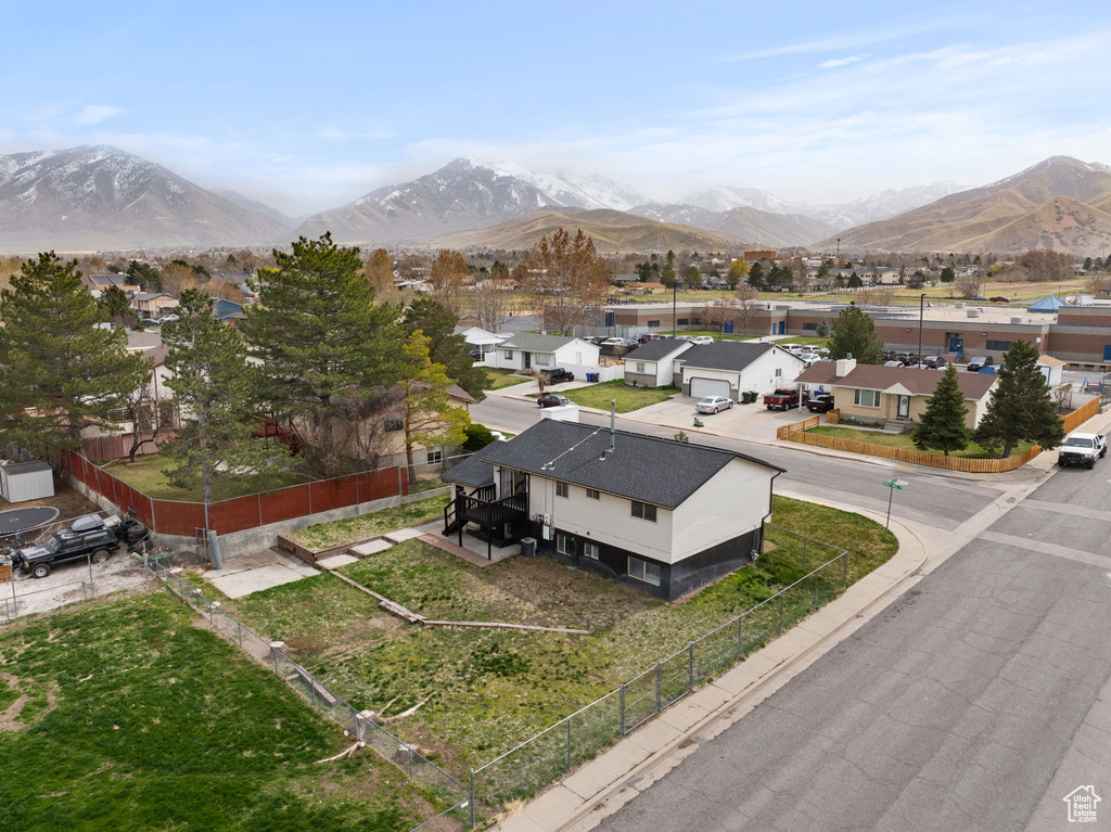 Drone / aerial view with a residential view and a mountain view