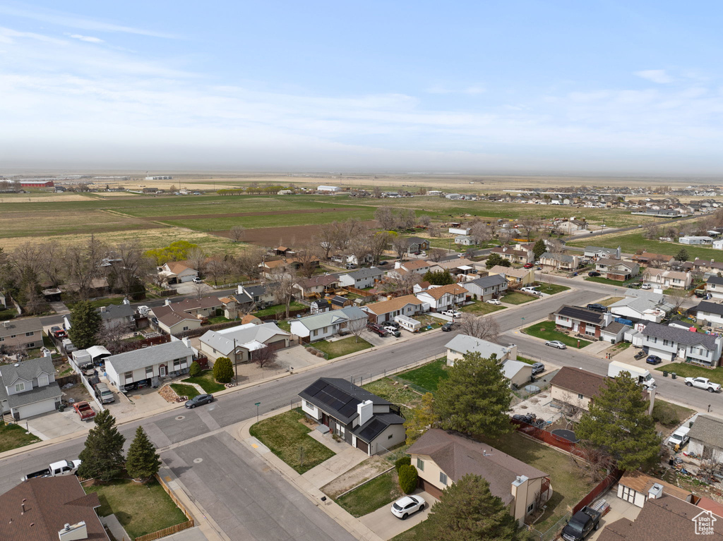 Birds eye view of property with a residential view