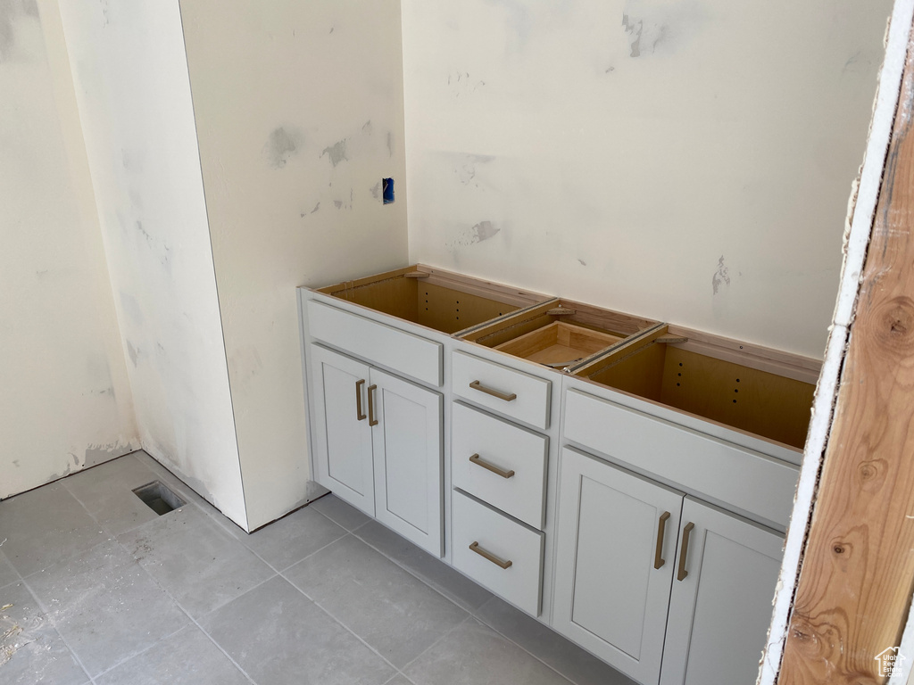 Bathroom with tile patterned floors