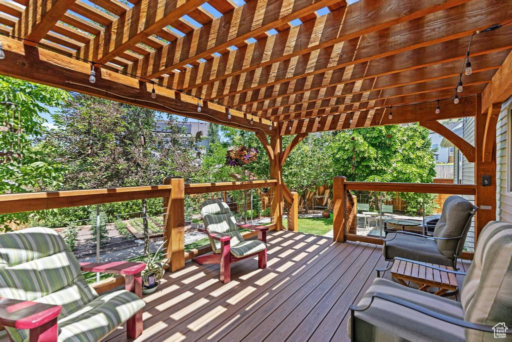 Wooden terrace with a pergola