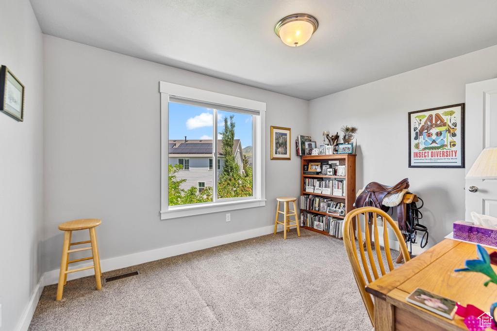 Office featuring carpet and baseboards
