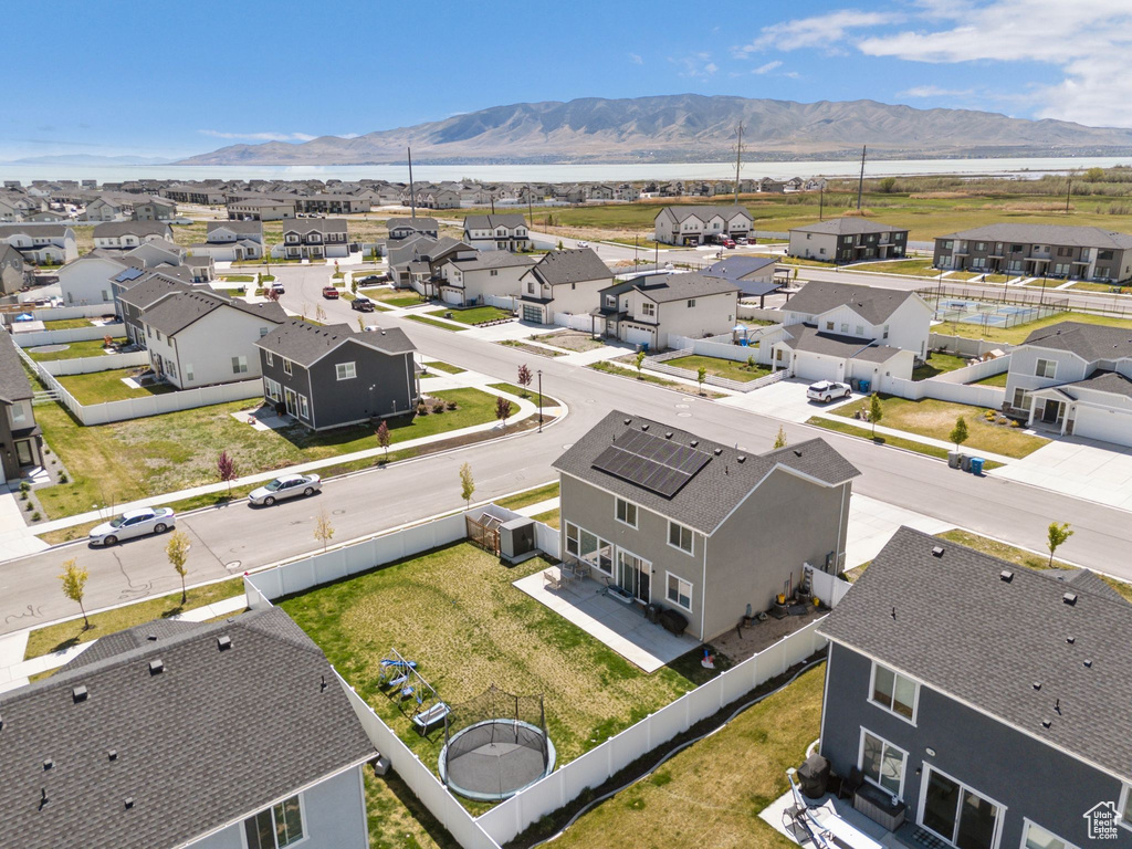 Drone / aerial view with a residential view and a mountain view
