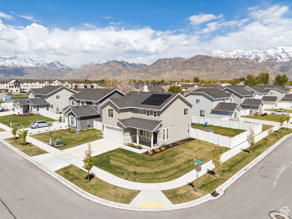 Birds eye view of property featuring a mountain view and a residential view