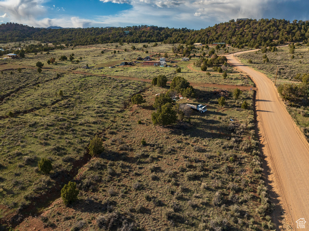Drone / aerial view with a mountain view and a rural view