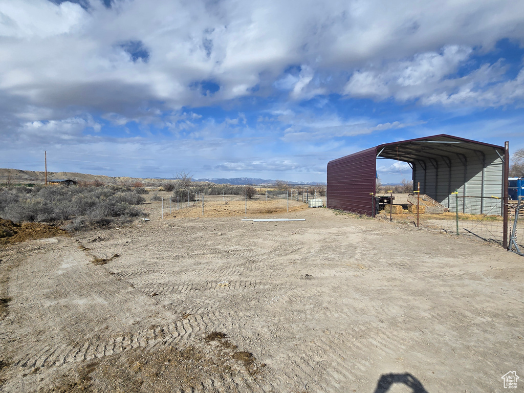 View of yard featuring a carport