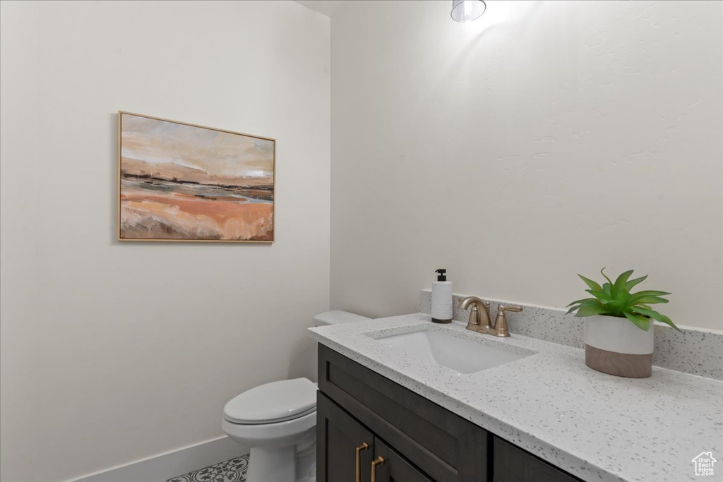 Bathroom featuring toilet and vanity