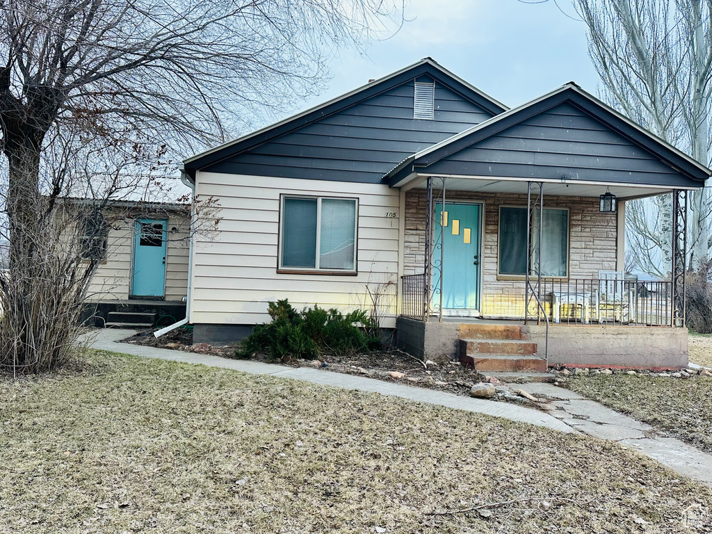 Bungalow-style home featuring covered porch and entry steps