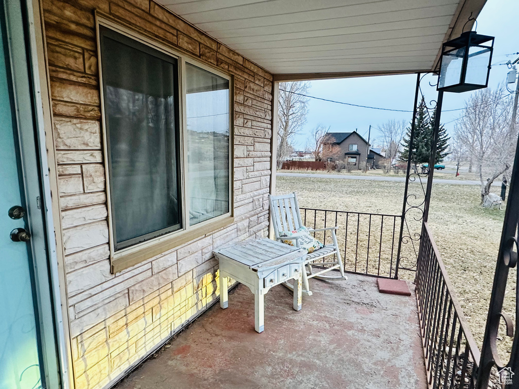 View of patio with a porch