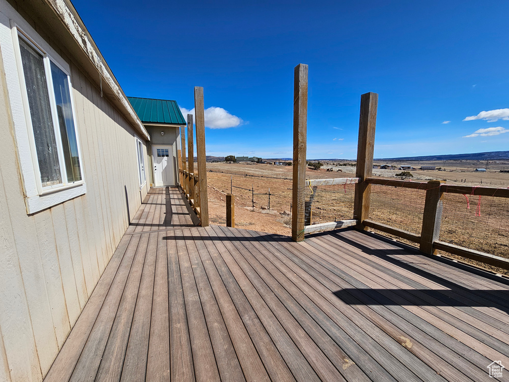 Wooden deck with a rural view