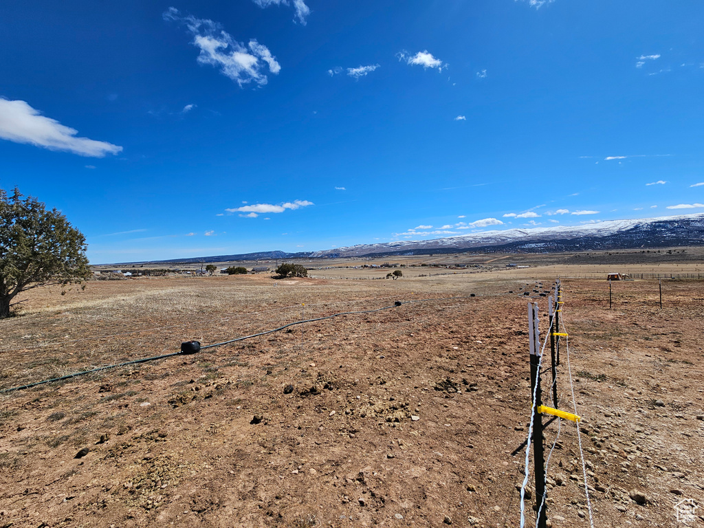 Exterior space with a rural view and a mountain view