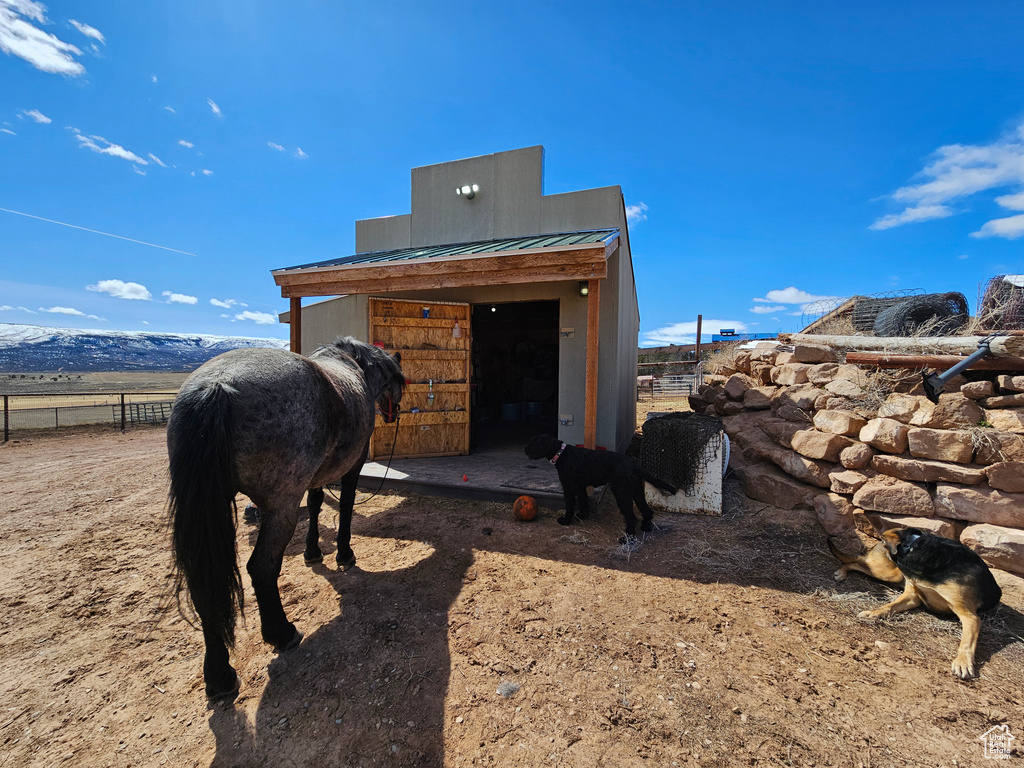 View of outbuilding featuring an outdoor structure and an exterior structure