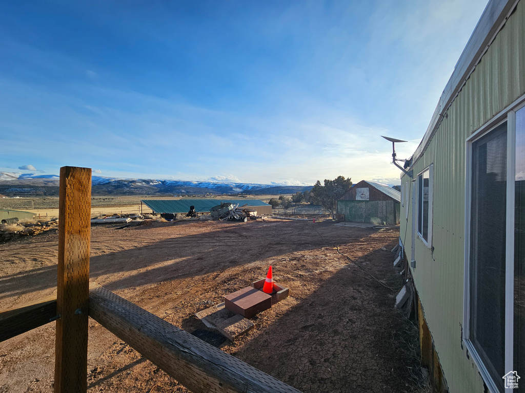 View of yard featuring a mountain view