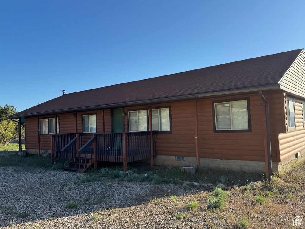 View of front of property with crawl space