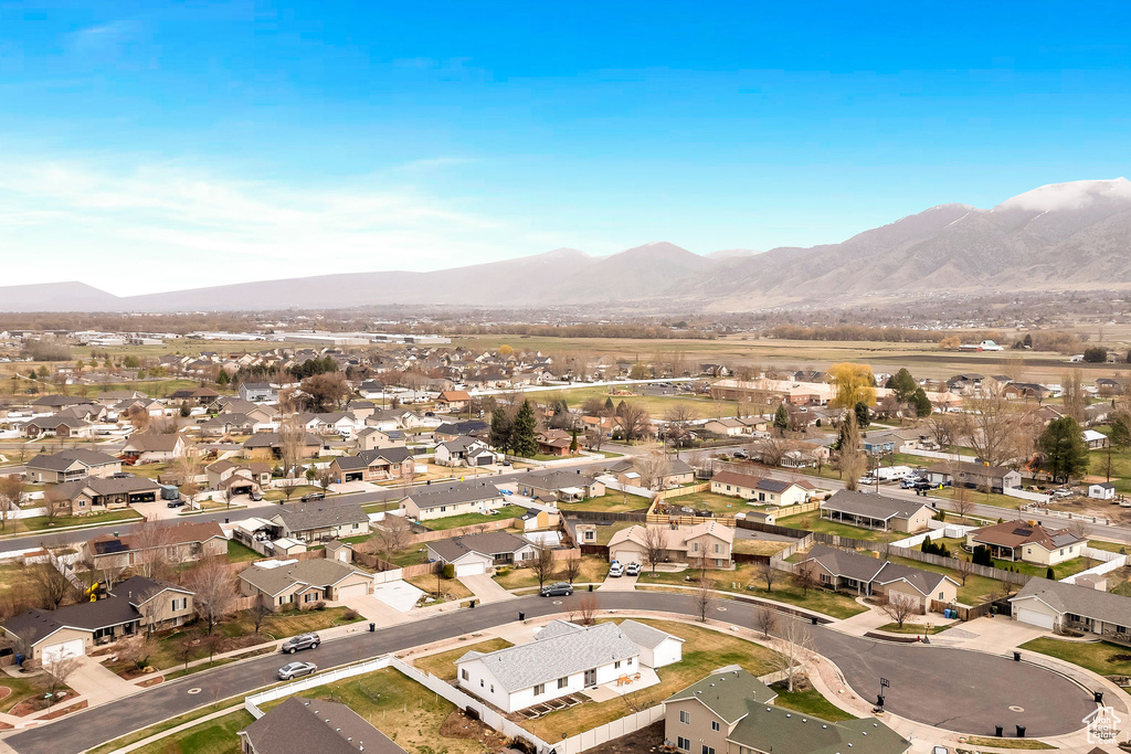 Birds eye view of property with a residential view and a mountain view