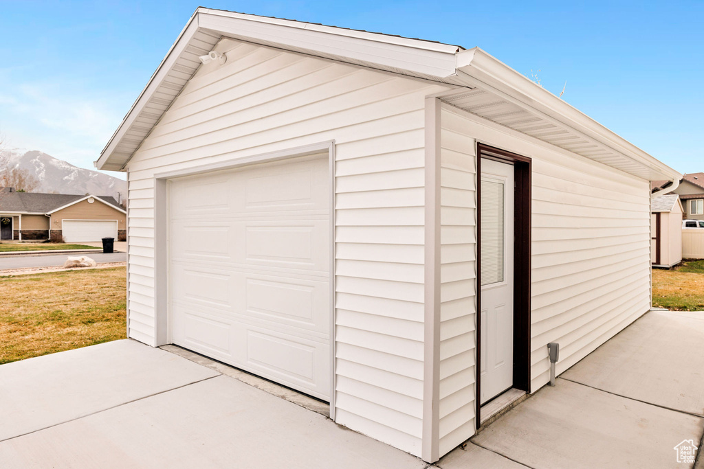 Detached garage with a mountain view
