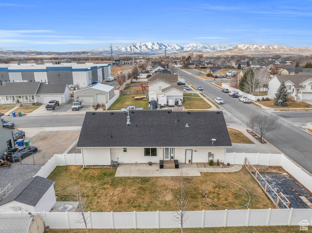 Drone / aerial view featuring a residential view and a mountain view