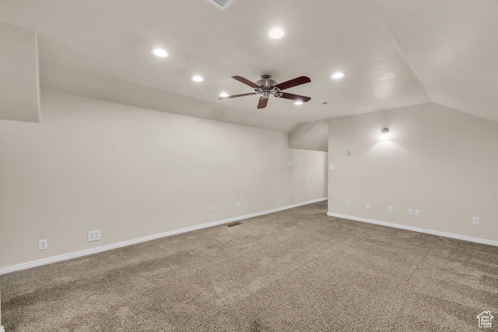 Empty room with carpet flooring, visible vents, recessed lighting, and a ceiling fan