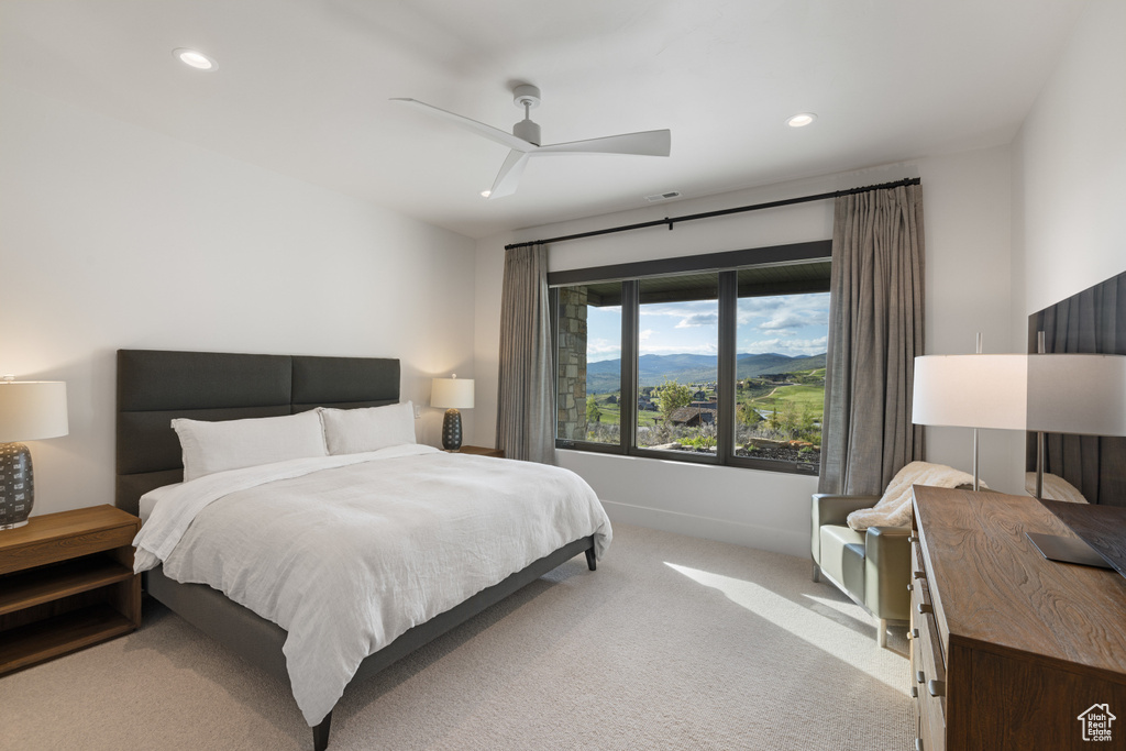 Bedroom featuring carpet flooring, recessed lighting, ceiling fan, and baseboards