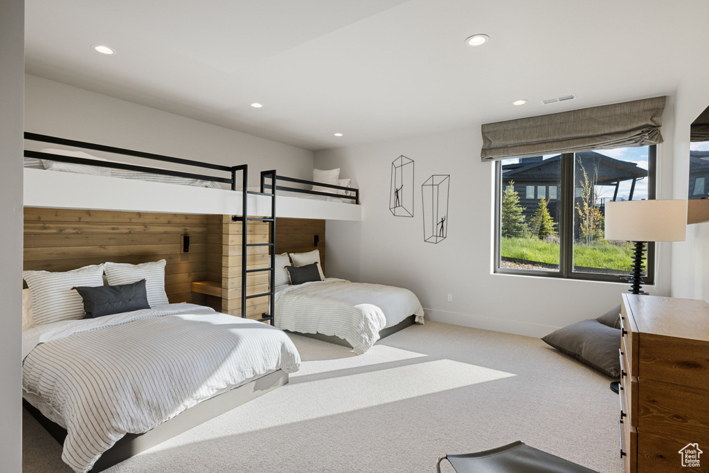 Bedroom with carpet flooring, recessed lighting, and baseboards