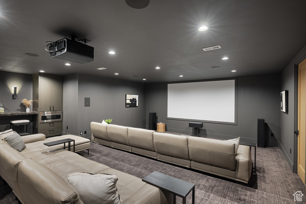 Carpeted cinema featuring recessed lighting and baseboards