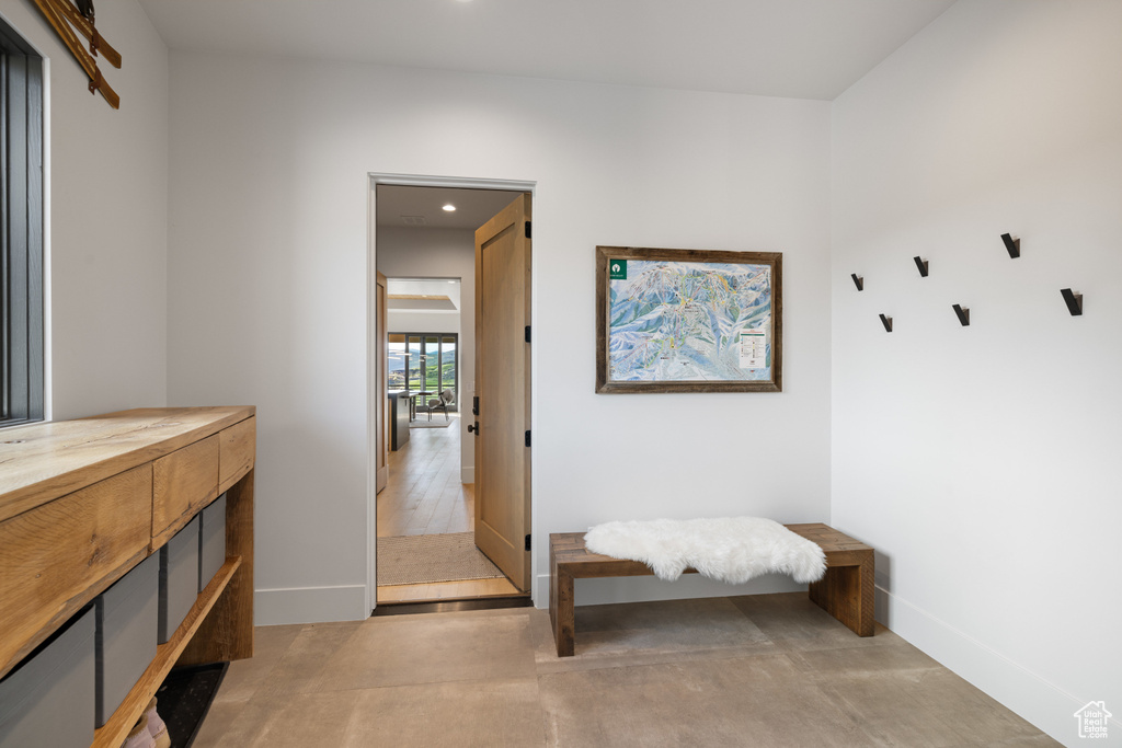 Mudroom with baseboards and recessed lighting