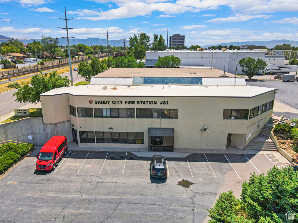 Exterior space featuring uncovered parking