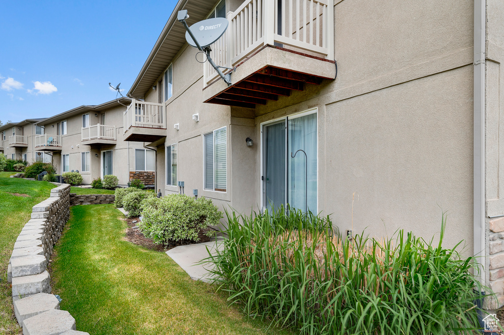 View of community featuring a lawn