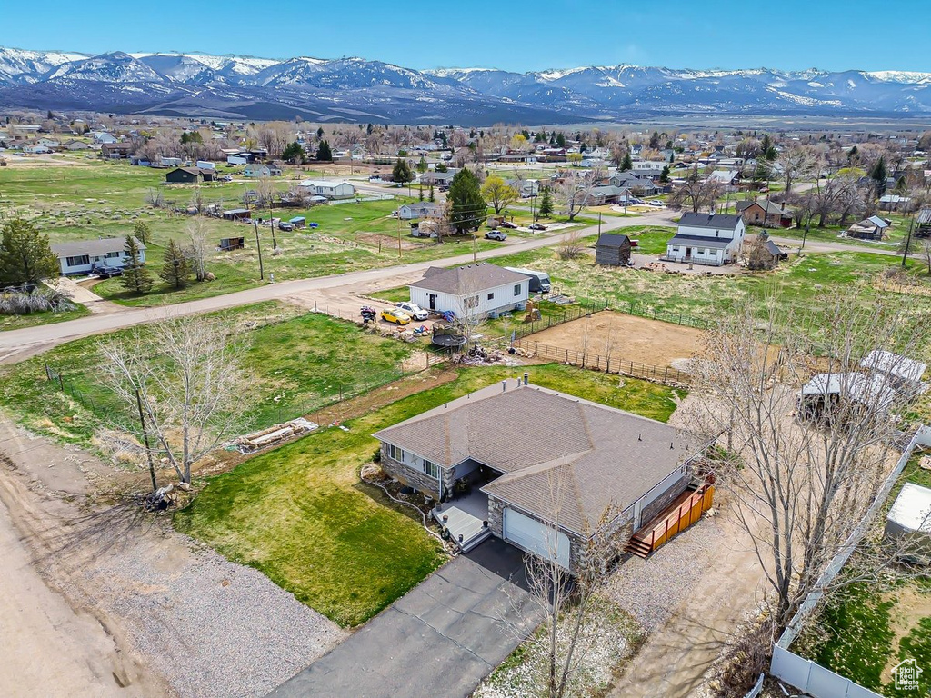Birds eye view of property featuring a residential view and a mountain view