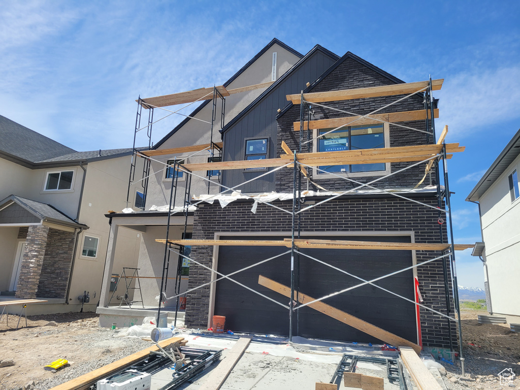 View of front of property with stucco siding