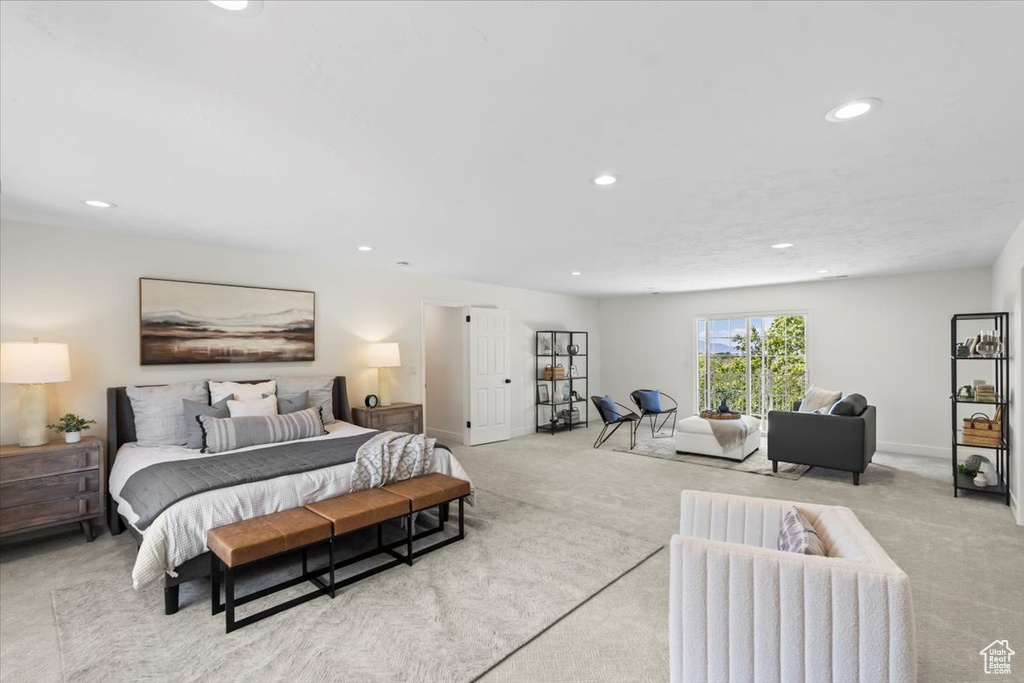 Carpeted bedroom featuring baseboards and recessed lighting