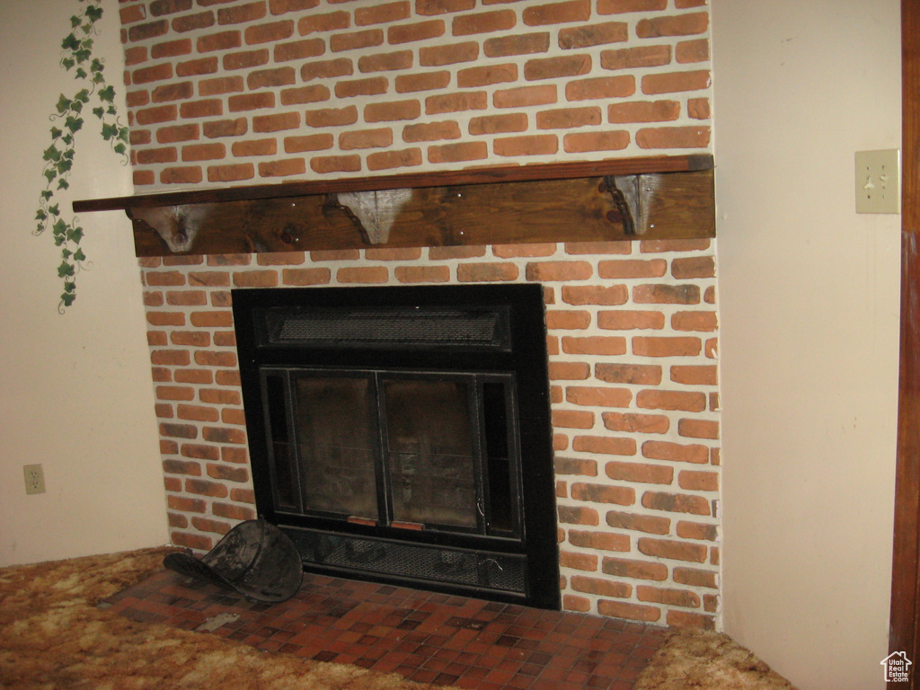 Interior details with a brick fireplace