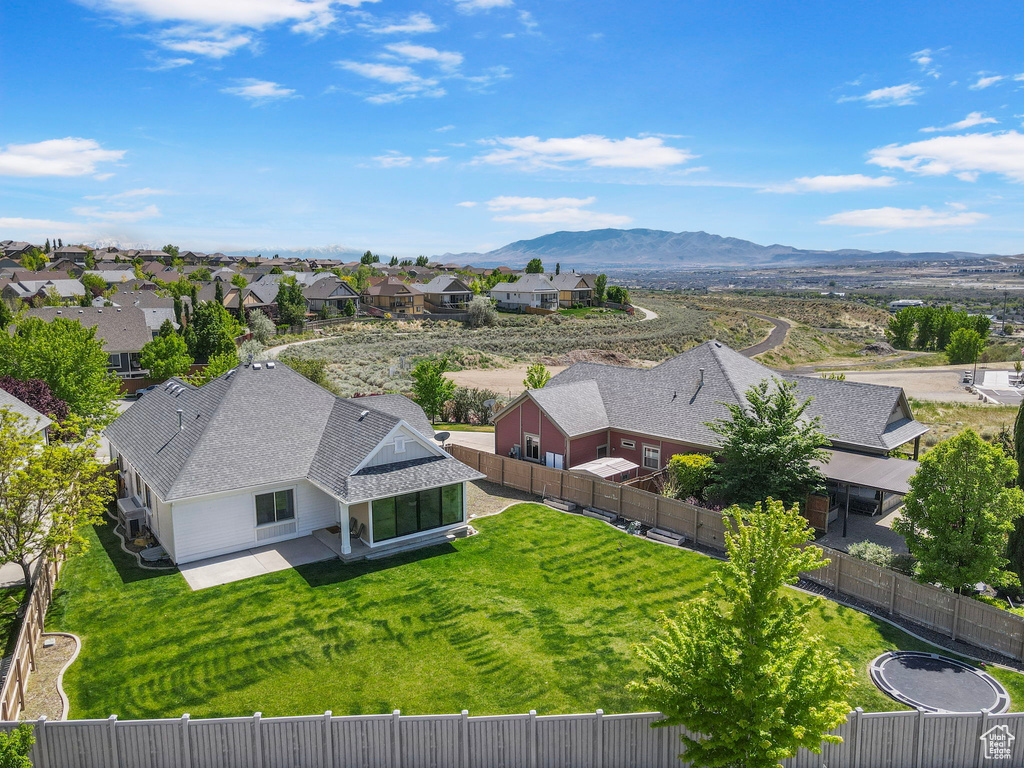 Aerial view of residential area with a mountain backdrop