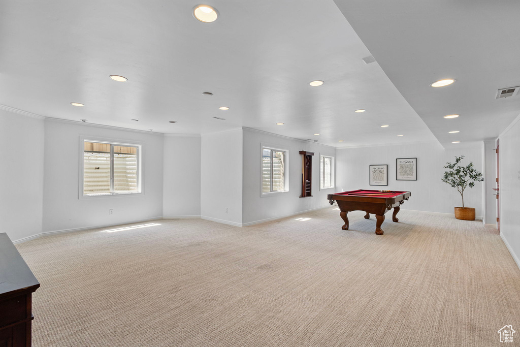 Game room featuring light colored carpet, billiards table, recessed lighting, baseboards, and crown molding
