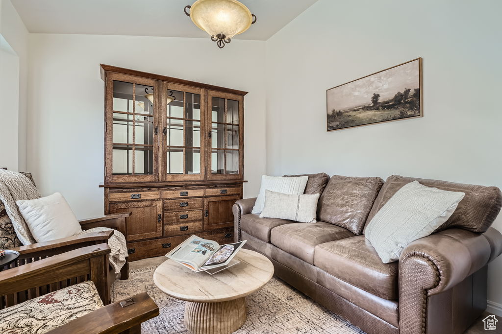 Living area featuring vaulted ceiling