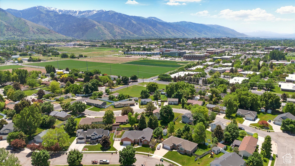 Aerial view of residential area with a mountainous background