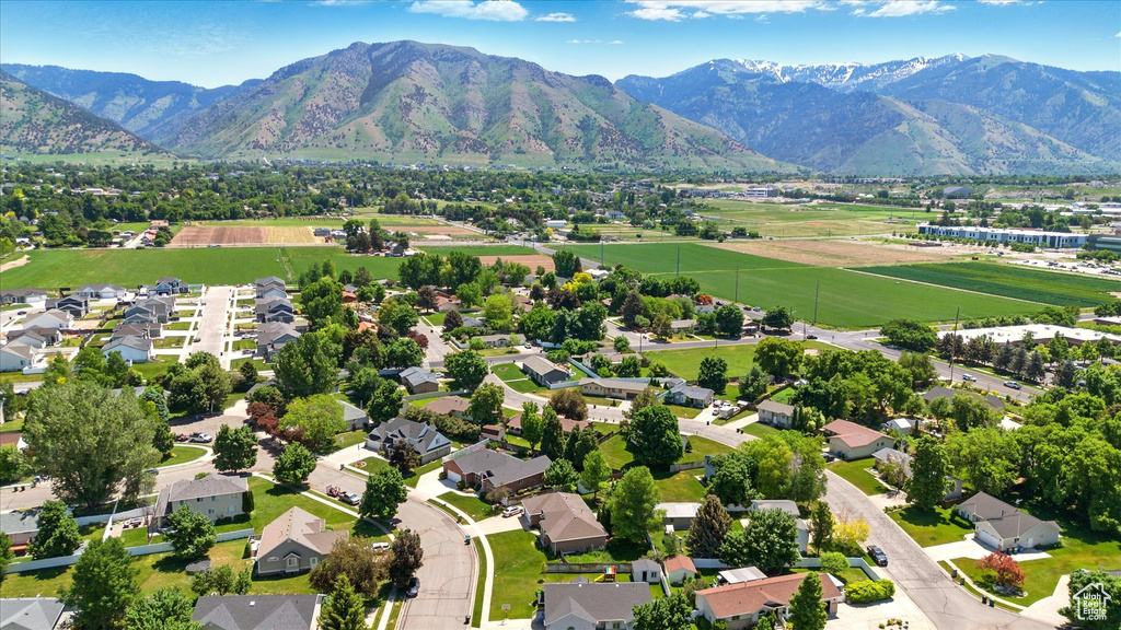Aerial view of residential area with a mountainous background