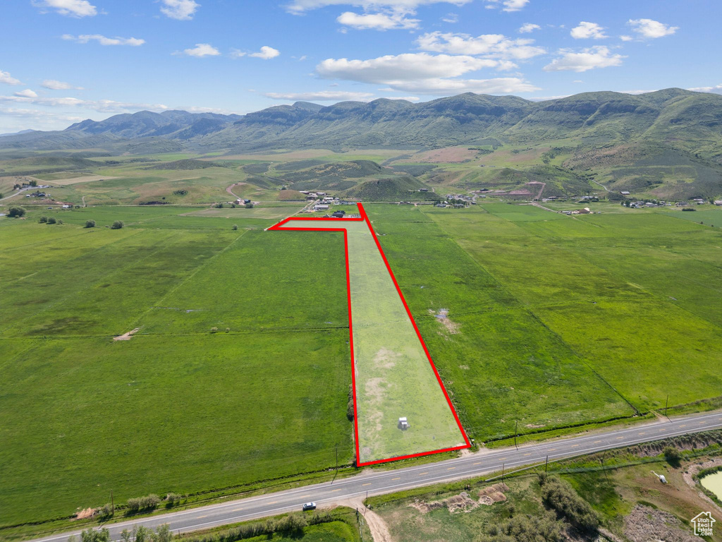 View of rural area with property parcel outlined and mountains
