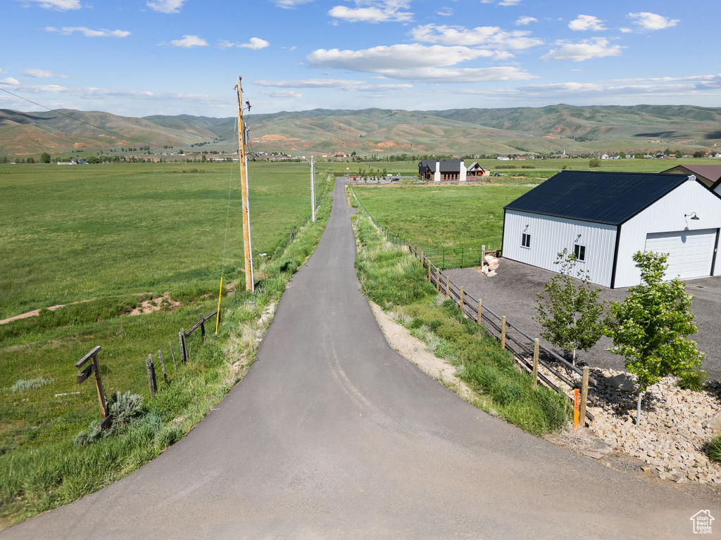 Overview of rural landscape with a mountain backdrop