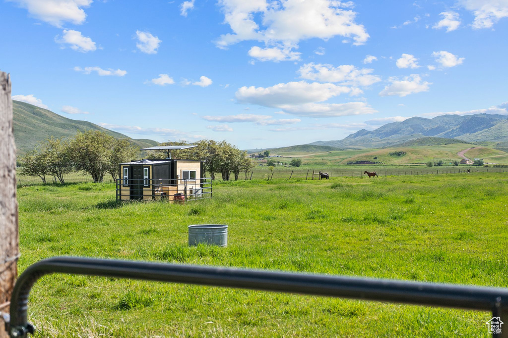 View of mountain background with rural landscape and a pastoral area