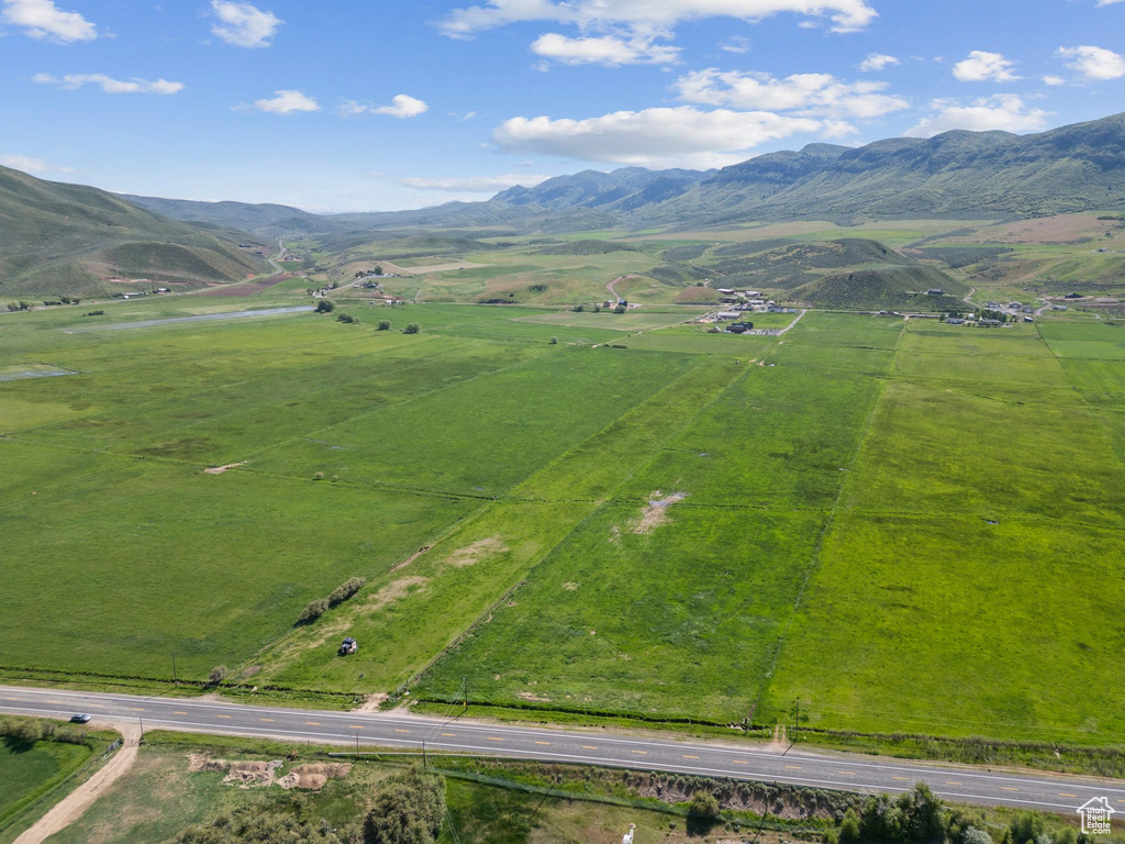 Aerial view of sparsely populated area with a mountainous background