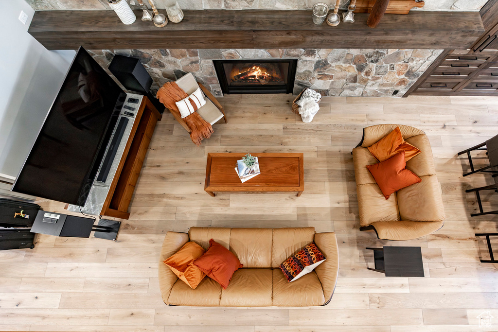 Living room with a stone fireplace