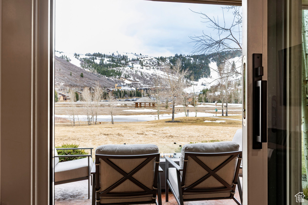 Doorway featuring a mountain view