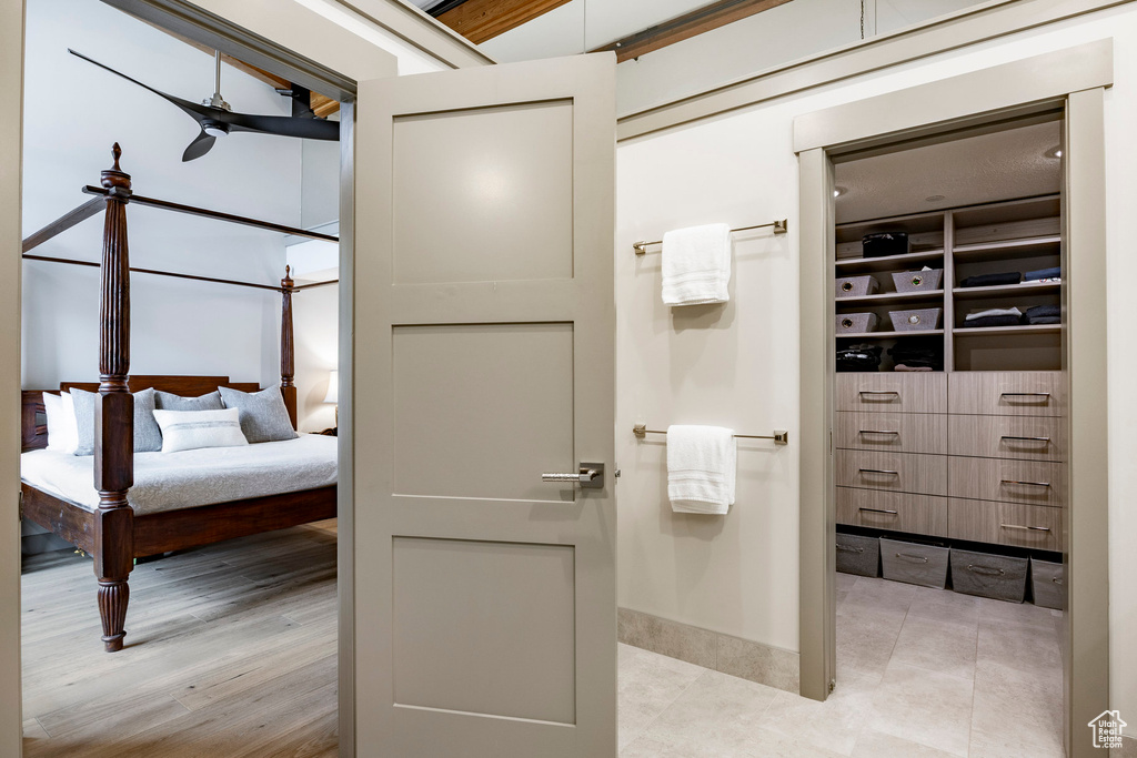 Interior space featuring baseboards and wood finished floors